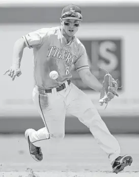  ?? Gerald Herbert / Associated Press ?? Notice that No. 8 on LSU shortstop Alex Bregman’s jersey? It’s reserved for the Tigers’ best player and has been donned by Bregman the past two seasons.