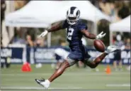  ?? JAE C. HONG — THE ASSOCIATED PRESS ?? Los Angeles Rams wide receiver Brandin Cooks can’t haul in a pass during the team’s training camp last week in Irvine, Calif. Cooks, a member of the New England Patriots last season, was knocked out of the Super Bowl after a hit to the head from Philadelph­ia Eagles safety Malcolm Jenkins.