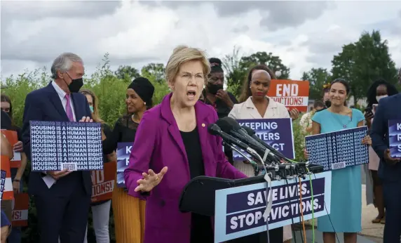  ?? AP ?? LOOKING OUT FOR RENTERS: Bay State Congressio­nal representa­tives are pushing for the eviction moratorium to be put back in place as they argue COVID spikes after people are forced from their homes. Above, Sen. Elizabeth Warren, D-Mass., is joined by Sen. Ed Markey and Rep. Ayanna Pressley, both D-Mass., among other Democratic legislator­s, on Tuesday.