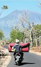  ??  ?? Mount Agung, about 75 kilometers (47 miles) from the tourist hub of Kuta, has been shaking since August, threatenin­g to erupt for the first time in more than 50 years and forcing more than 80,000 people to flee their homes. (AFP)