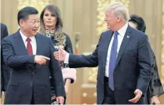  ?? AP ?? US President Donald Trump and China’s President Xi Jinping meet in Beijing, China. Mr Trump is closing in on a decision to impose punishing tariffs on Chinese goods.