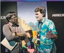  ?? Gabrielle Lurie AFP/Getty Images ?? ANDURIL founder Palmer Luckey, right, is a Trump supporter and one of the tech industry’s most outspoken right-wing figures.