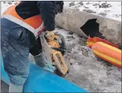  ?? City of Calgary ?? The PVC replacemen­t is seen beside the cracked castiron pipe that flooded Crowchild Trail on the weekend.