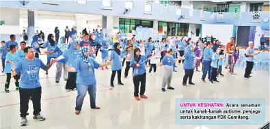  ??  ?? UNTUK KESIHATAN: Acara senaman untuk kanak-kanak autisme, penjaga serta kakitangan PDK Gemilang.