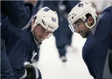  ?? DAN JANISSE/POSTMEDIA NEWS ?? Toronto centre Dave Bolland, left, practises draws against Nazem Kadri. Bolland may return to the lineup Saturday.