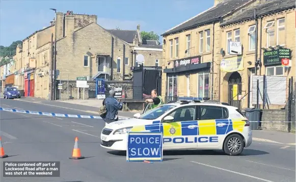  ??  ?? Police cordoned off part of Lockwood Road after a man was shot at the weekend