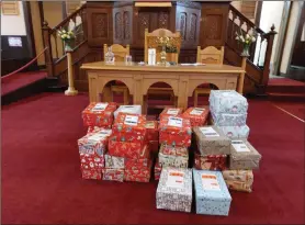  ?? ?? KIND GESTURE: Just a few of the many shoeboxes filled with gifts collected by Townhill and Kingseat Parish Church.
