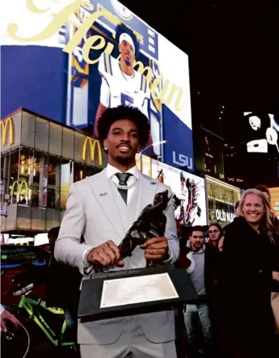  ?? TODD VAN EMST/POOL PHOTO VIA AP ?? Heisman Trophy winner Jayden Daniels certainly would give the Patriots offense a lift.