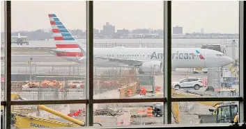  ?? — AFP photo ?? File photo shows an American Airlines 737 Max sitting at the gate at LaGuardia airport in New York.