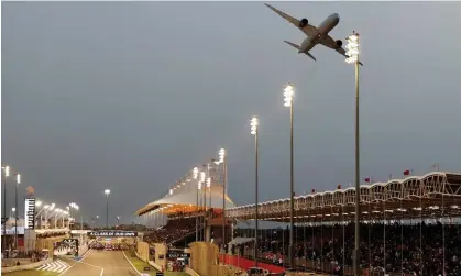  ?? ?? A plane flies over the track before the 2022 Bahrain Grand Prix. Photograph: Hamad I Mohammed/Reuters