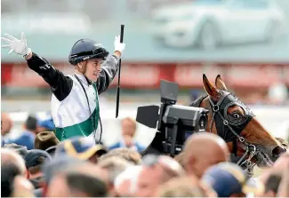  ?? PHOTO: GETTY IMAGES ?? Cory Parish celebrates following his upset Caulfield Cup win aboard Boom Time.