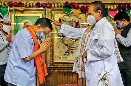  ?? — PTI ?? Delhi Chief Minister Arvind Kejriwal offers prayers at Lord Krishna temple during his visit ahead of the Gujarat 2022 Assembly elections, in Ahmedabad on Monday.