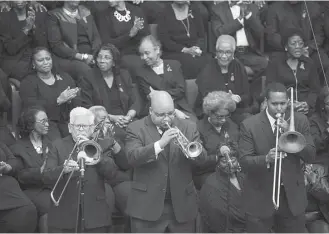  ?? Mark Mulligan / Houston Chronicle ?? Musicians with Jazz Houston perform during a celebratio­n of life service for City Councilman Larry Green on Monday at Brentwood Baptist Church. His cause of death remains unknown.