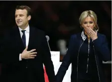  ??  ?? French president-elect Emmanuel Macron with his wife Brigitte