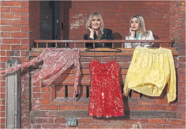  ?? STEVE RUSSELL TORONTO STAR ?? Sisters Bianca and Aja Tomori have been cleaning out overstuffe­d closets and dressers and selling the surplus, mostly vintage clothing, on Instagram. They style and model the items and write short descriptio­ns to go with the photos.