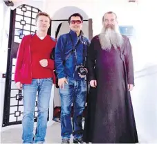  ??  ?? WITH PETRand an Orthodox priest.