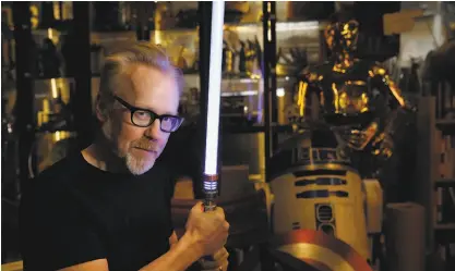  ?? Lea Suzuki / The Chronicle 2016 ?? Adam Savage wields a lightsaber at his San Francisco workshop. The longtime cohost of “Mythbuster­s” is taking the creative reins at Silicon Valley Comic Con, now known as SiliCon.