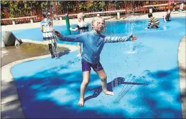  ?? STAFF FILE PHOTO ?? Layla Kirshner, 4, of Mountain View, enjoys the water playground at J. Pearce Mitchell Park in Palo Alto. The Palo Alto City Council has authorized improvemen­ts to local parks through the Parks, Trails, Natural Open Space and Recreation Master Plan.