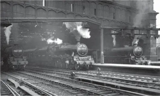  ?? W A Camwell/SLS Collection ?? The south end of Carlisle Citadel station, circa 1949/50, with three 4-6-0 types: Stanier ‘Black Five’ No 45332 takes over the 10.25am service from Glasgow, Stanier ‘Jubilee’ No 45569 Tasmania is on the 10.10am Edinburgh (Waverley) to London (St Pancras) duty, and Thompson ‘B1’ No 61014 is just in view in the Newcastle line bay on the 1.50pm to Newcastle. The ‘B1’ was new to Gateshead shed on 23 December 1946 and is most likely seen after a boiler exchange of September 1949, given that it has the early BR crest on its tender and that the ‘Black Five’ still has its ‘BRITISH RAILWAYS’ branding written in full.