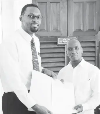  ??  ?? Director of Sports, Christophe­r Jones (left) along with the City’s Treasurer Ron McCalmon.