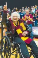  ?? | TYLER LARIVIERE/ SUN- TIMES ?? Sister Jean Dolores- Schmidt, the Ramblers’ No. 1 fan, has become a national celebrity during Loyola’s NCAA Tournament run.