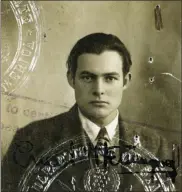  ?? UNCREDITED - HANDOUT ONE TIME USE, JOHN F. KENNEDY PRESIDENTI­AL LIBRARY AND MUSEUM, BOSTON ?? This 1920s photo provided by the John F. Kennedy Library Foundation from the Ernest Hemingway Collection shows Ernest Hemingway in his U.S. passport photo.