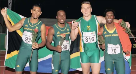  ??  ?? GOLDEN BOYS: The South African men’s 4x100m relay team of Wayde van Niekerk, Akani Simbine, Emile Erasmus and Gift Leotelo celebrate their gold medal at the African Athletics Championsh­ips at the Kings Park Athletics Stadium in Durban last night.