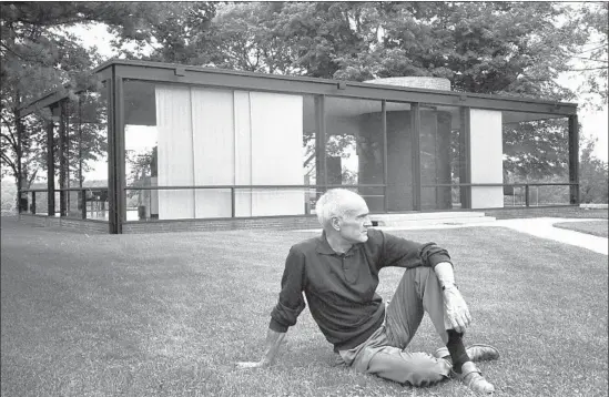  ?? David McLane Getty Images ?? PHILIP Johnson in the glass house he designed for himself in Connecticu­t. He left the property to the National Trust for Historic Preservati­on when he died in 2005.