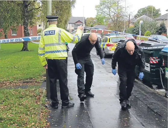  ?? Pictures: Kim Cessford. ?? Police and investigat­ing officers at the scene on Nursery Road, Broughty Ferry, yesterday.