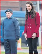  ??  ?? Kate poses with a cadet at RAF Wittering