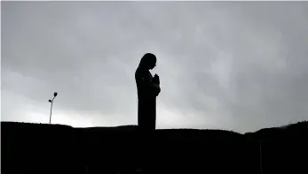  ??  ?? A photo taken on April 14, 2016 shows a statue of Mother Teresa, the nun who spent most of her life caring for the sick and the poor in India, placed in Qafe Thane, near the Macedonian border. (AFP)