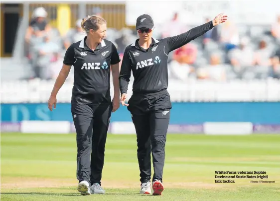  ?? Photo / Photosport ?? White Ferns veterans Sophie Devine and Suzie Bates (right) talk tactics.