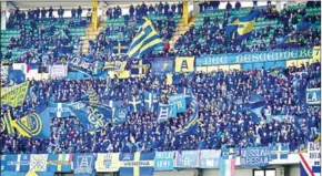  ?? AFP ?? Verona fans cheer during the Italian Serie A football match against Napoli on Sunday.
