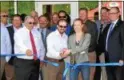  ?? PHOTOS BY JOHN BREWER — ONEIDA DAILY
DISPATCH ?? Local and state dignitarie­s join Matt Whalen and Carrie Blackmore as they celebrate the grand opening of their new beer garden and farm brewery.