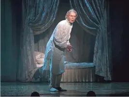  ?? MICHAEL BROSILOW ?? Jonathan Wainwright portrays the miser Scrooge in Milwaukee Repertory Theater’s “A Christmas Carol.”