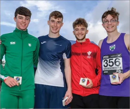  ?? Photo by Bobby Gavin ?? Luke O’Carroll, left, who won a silver medal in the U18 boys’ long jump event with a new personal best at the Celtic Games in Scotland last weekend.
