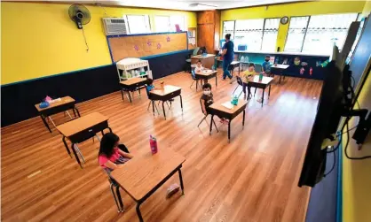  ?? Photograph: Frederic J Brown/AFP/Getty Images ?? An overwhelmi­ng majority of both teachers and parents agree that it should be a standard feature of classroom learning.