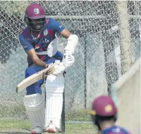  ?? (Photo: AFP) ?? West Indies’ Captain Kraigg Brathwaite (left) bats in the nets during a training session at the Sher-e-bangla National Cricket Stadium in Dhaka on Wednesday ahead of the second Test match against Bangladesh which was slated to bowl off last night (Jamaica time).