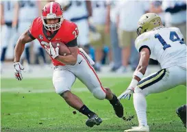  ??  ?? Georgia's Nick Chubb, left, is one of the nation's top running backs.