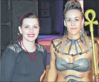  ?? CHRISTIAN ROACH/CAPE BRETON POST ?? Nicole Smith, left, stands with her model, Jenna Gentremont, who is modelling as an Egyptian warrior at the Cosmetolog­y Associatio­n of Nova Scotia’s annual meeting at the Membertou Trade and Convention Centre on Saturday evening.