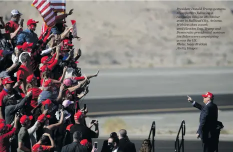  ?? Photo: Isaac Brekken
/Getty Images ?? President Donald Trump gestures to supporters following a campaign rally on 28 October 2020 in Bullhead City, Arizona. With less than a week until Election Day, Trump and Democratic presidenti­al nominee Joe Biden were campaignin­g across the US.