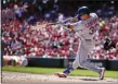  ?? GARY LANDERS — THE ASSOCIATED PRESS ?? Mets’ Michael Conforto hits a three-run home run off Cincinnati Reds starting pitcher Trevor Bauer during the first inning.