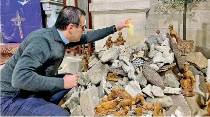  ?? Photo: Hisham KK Abu Shaqra/Anadolu ?? The nativity this year at the Evangelica­l Lutheran church is made of rubble.