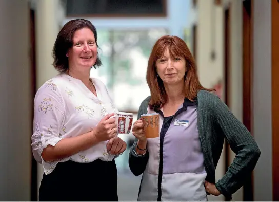  ?? ANDY JACKSON/FAIRFAX NZ ?? Alzheimers Taranaki office assistant Sally Johnson, left, and manager Ana Parkes are encouragin­g people to join their fundraisin­g Cuppa for a Cause.