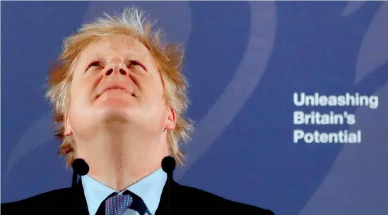  ??  ?? Britain's Prime Minister Boris Johnson reacts as he delivers a speech at the Old Royal Naval College in Greenwich, south east London on February 3, 2020