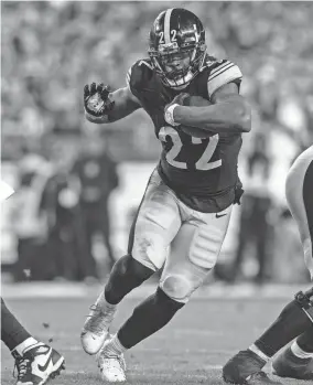  ?? MATT DURISKO/AP ?? Steelers running back Najee Harris (22) rushes against the Bengals on Saturday in Pittsburgh.