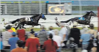  ?? CLIFFORD SKARSTEDT EXAMINER ?? Racing competitio­n from June 30 at Kawartha Downs in Fraservill­e.