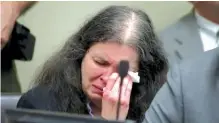  ?? KABC-TV VIA AP ?? Louise Turpin sobs and dabs her eyes as one of her children speaks during a sentencing hearing Friday in Riverside, Calif. Turpin and her husband, David, pleaded guilty to years of torture and abuse of 12 of their 13 children and were sentenced to life in prison.