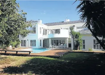  ??  ?? This four-bedroom house in Erinvale Country and Golf Estate in Somerset West will be auctioned on Saturday.