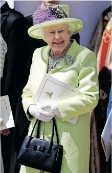  ?? ?? BRITAIN’S Queen Elizabeth reportedly used her handbag to signal to ladies-in-waiting when she wanted them to interrupt a conversati­on, or wanted to leave a situation. | Reuters